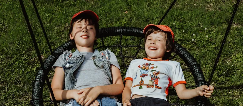 Kids Playing on a Swing